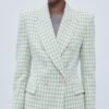 Blazer tweed con botones